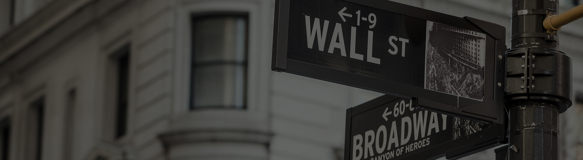 A street sign with a building in the background